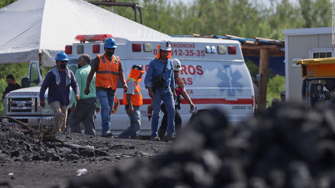 Rescuers race to free miners trapped in flooded mine in Mexico