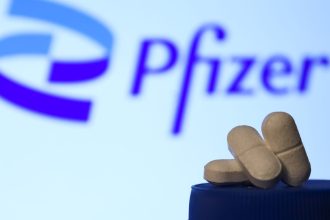 pfizer-beats-revenue-estimates,-raises-profit-outlook-on-cost-cuts-and-strong-non-covid-sales